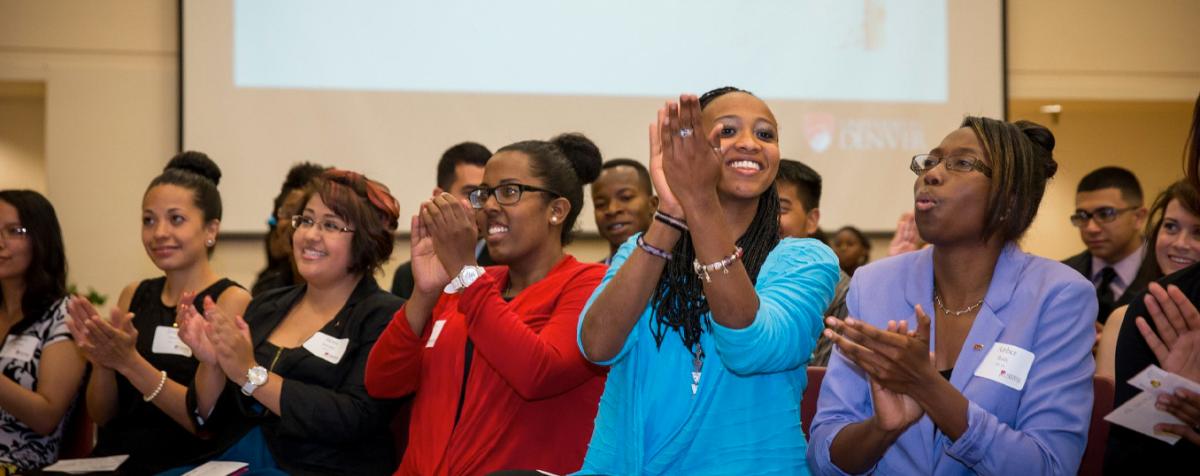 women enjoying themselves at a at a lecture